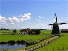 Windmühlen auf dem Bauernhof in Holland